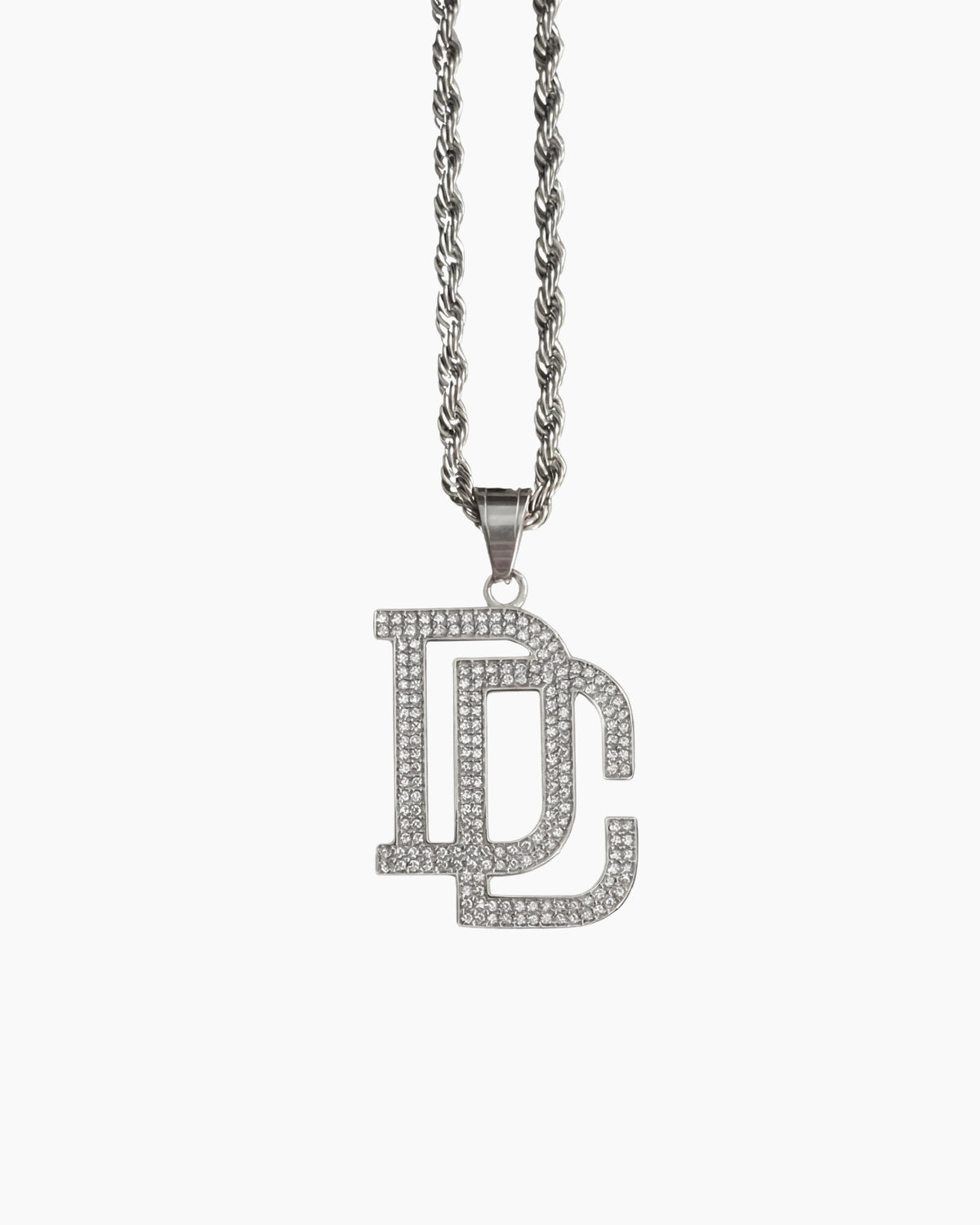 DC chain silver necklace studio photo