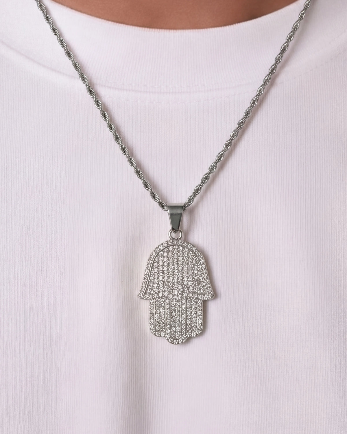Hamsa hand chain silver on model close up photo